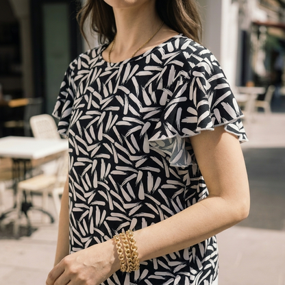 Blusa Mujer Cuello Redondo Estampada Diseño Moderno con Olán