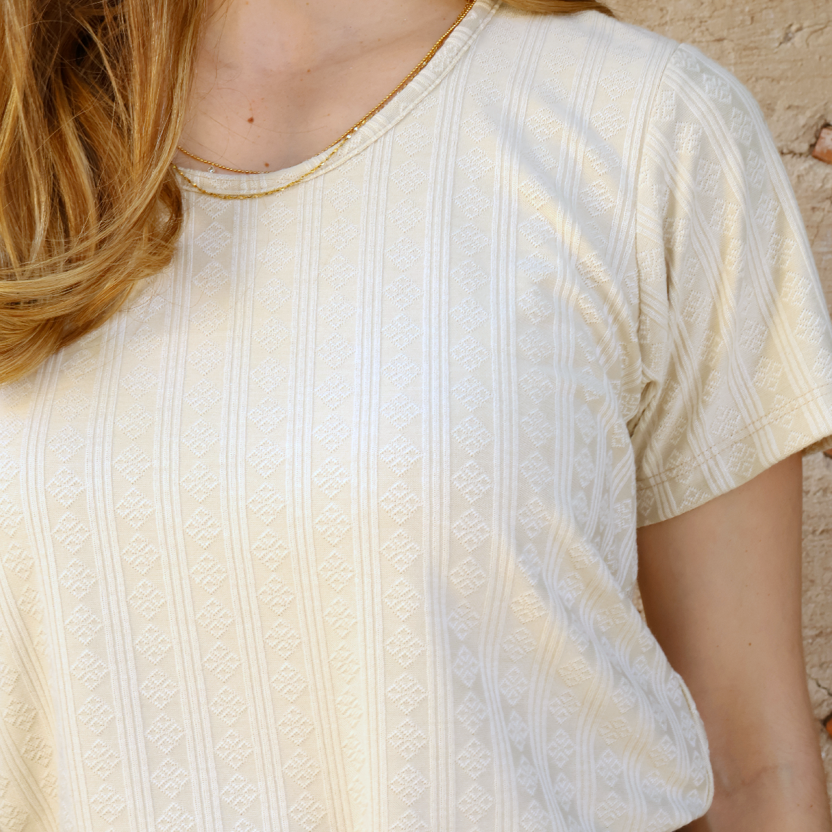 Blusa de manga corta con textura acanalada en color caki