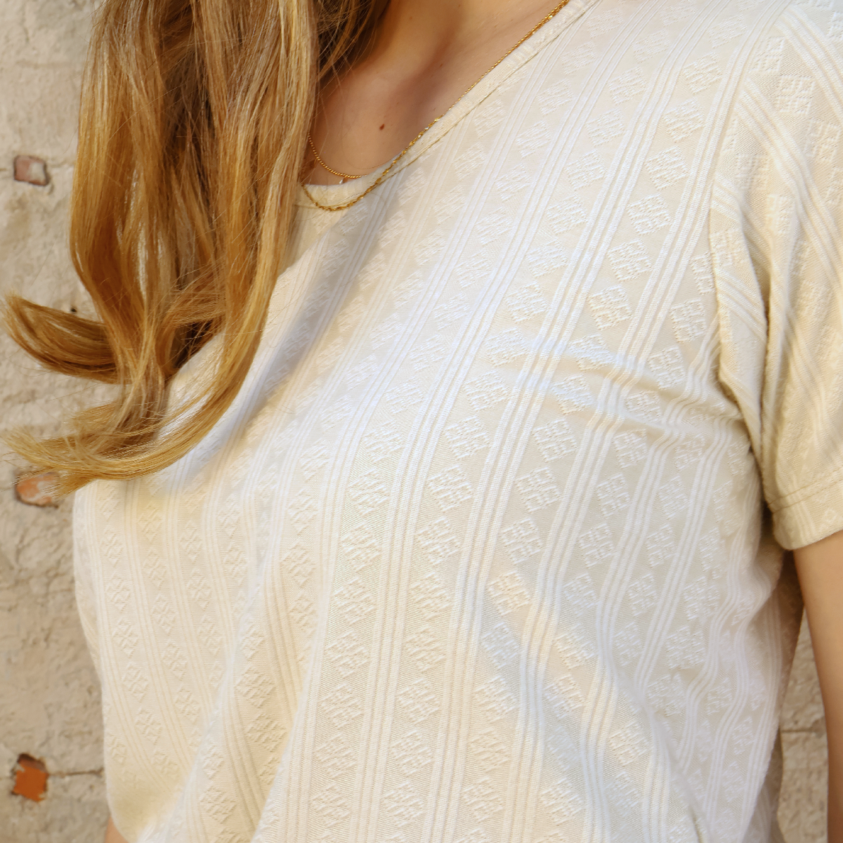 Blusa de manga corta con textura acanalada en color caki