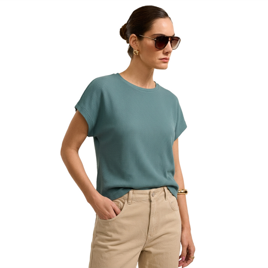Blusa de manga corta texturizada en color verde