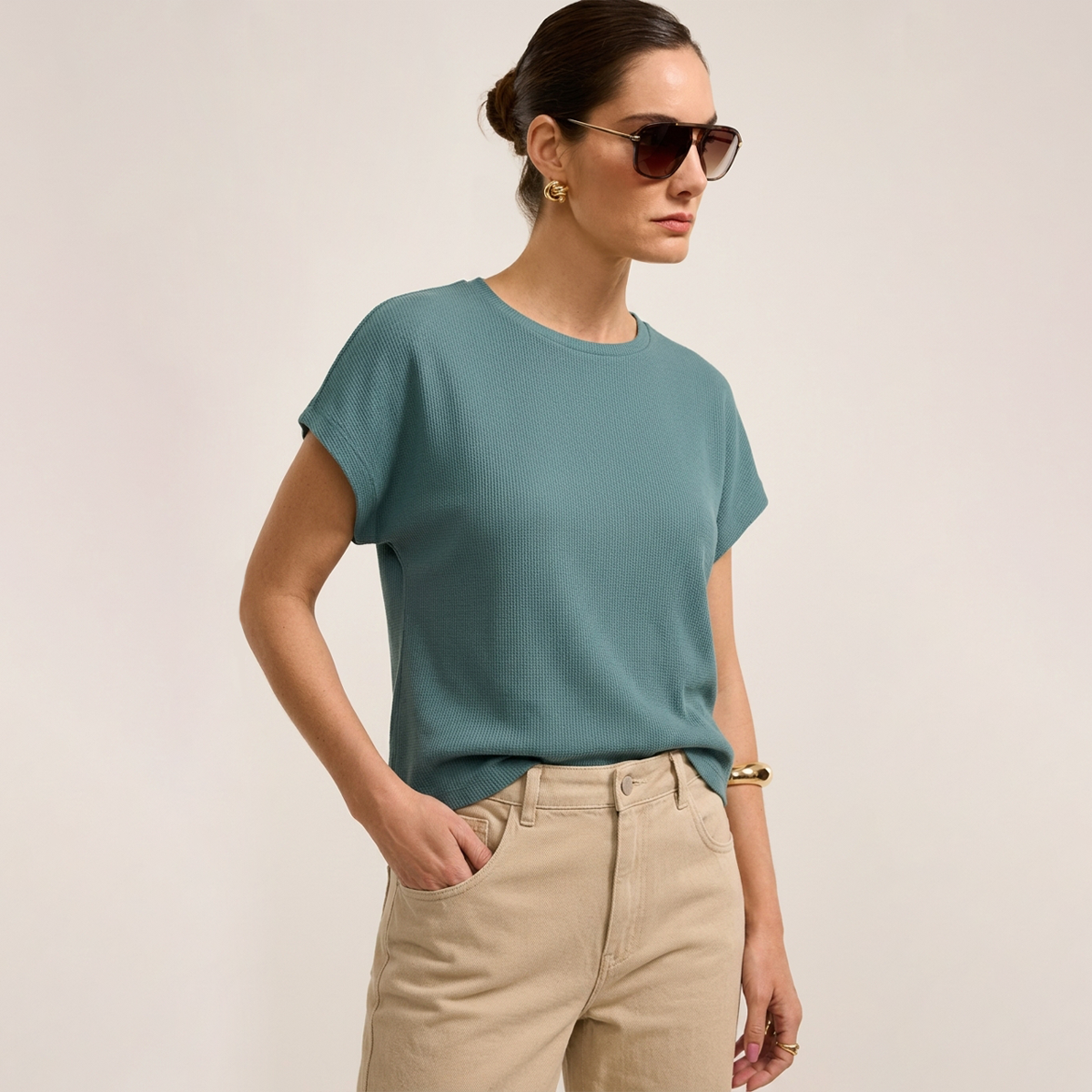 Blusa de manga corta texturizada en color verde