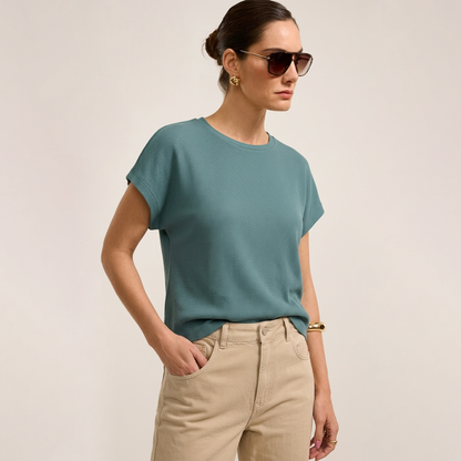 Blusa de manga corta texturizada en color verde