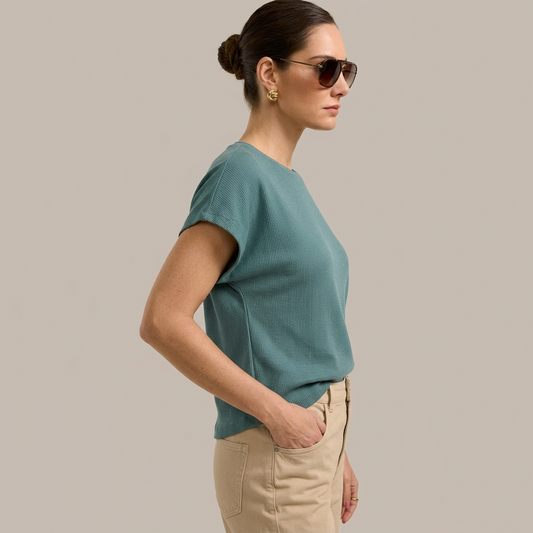 Blusa de manga corta texturizada en color verde