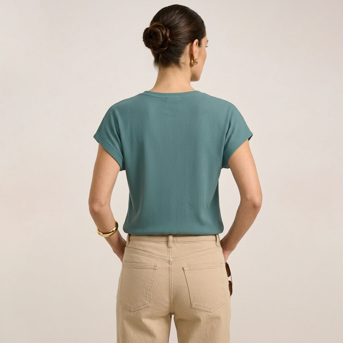 Blusa de manga corta texturizada en color verde