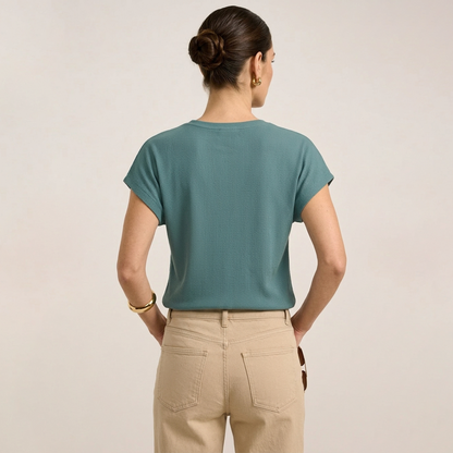 Blusa de manga corta texturizada en color verde